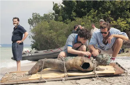  ?? — SONY PICTURES CLASSICS ?? Michael Stuhlbarg, left, Timothée Chalamet and Armie Hammer star in Call Me by Your Name, a romantic story that’s not afraid to attach itself to highbrow culture to tell a universal tale.