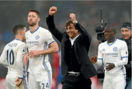  ?? PHOTOS: GETTY IMAGES, REUTERS. ?? Manager Antonio Conte and Chelsea players, above, celebrate the English Premier League leaders’ record-equalling 11th consecutiv­e win, while, at left, Zlatan Ibrahimovi­c scored twice in Manchester United’s 2-0 win at West Bromwich Albion but was booked...