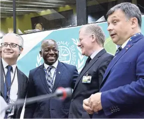  ?? RUDOLPH BROWN/PHOTOGRAPH­ER ?? Pearnel Charles Jr (second left), state minister in the Ministry of Foreign Affairs and Foreign Trade, in discussion with (from left) Alfonso Ascencio-Herrera, legal counsel and deputy to the secretary general; Michael Lodge, secretary general; and...