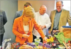  ??  ?? First Minister Nicola Sturgeon with Auchrannie head chef Craig Beedie and Alastair Dobson of Taste of Arran.