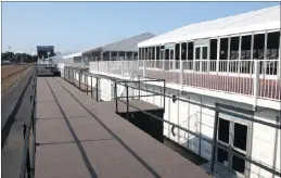  ??  ?? TENT TOWN: The row of double-decker marquees along the final straight at Greyville.