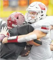  ??  ?? Whitwell’s Thundur Roberts, right, stops Cornersvil­le’s Trenton Warren on a third down play Saturday.