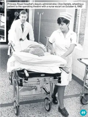  ??  ?? VISIT EMAIL CALL
Princess Royal Hospital’s deputy administra­tor, Clive Daniels, wheeling a patient to the operating theatre with a nurse escort on October 6, 1982 49