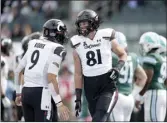  ?? AP file photo ?? Unbeaten Cincinnati is ranked sixth in the initial College Football Playoff rankings, dinged because of a mostly soft schedule.