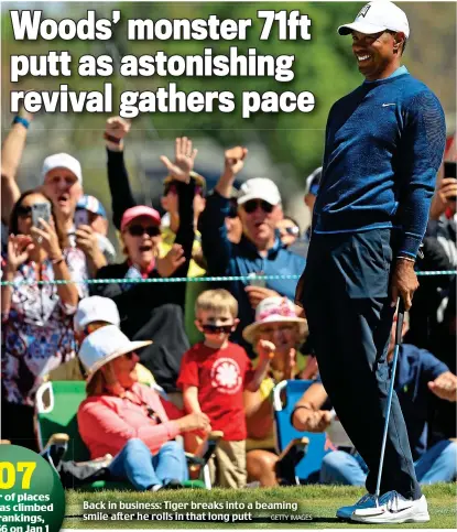  ?? GETTY IMAGES ?? Back in business: Tiger breaks into a beaming smile after he rolls in that long putt