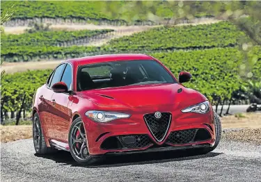  ??  ?? GOING LATIN: The Alfa Romeo’s stunning D-Segment offering, the Giulia and Giulia QV, was launched following its highly publicised internatio­nal debut last year