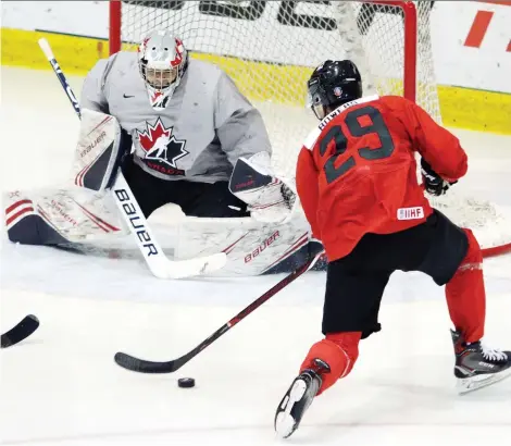  ?? CHAD HIPOLITO/THE CANADIAN PRESS ?? Goalie Mike DiPietro, who led the Windsor Spitfires to a Memorial Cup in 2017, gets a chance to show his wares in a world junior championsh­ip after being a late cut last year. Canada’s tandem of DiPietro and Ian Scott is considered the best at this year’s tourney.