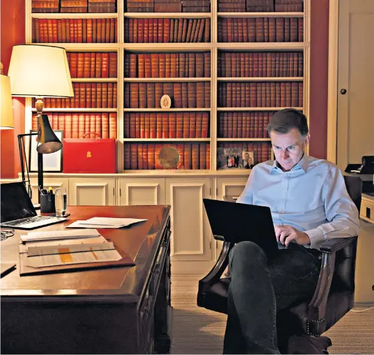  ?? ?? A moment of solitary calm for Jeremy Hunt in No 11 Downing Street before he delivers his Budget in the House of Commons this afternoon