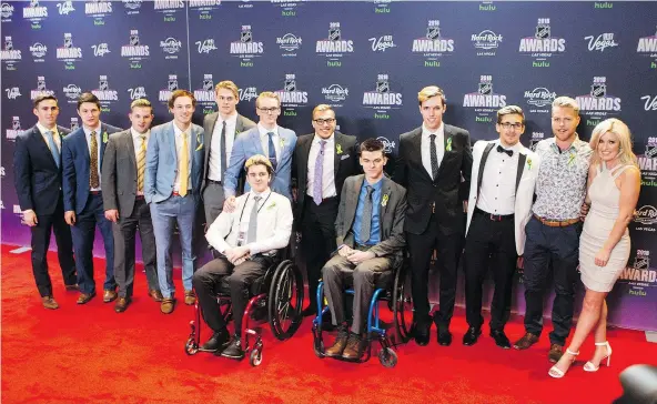  ?? LIAM RICHARDS ?? Surviving members of the Humboldt Broncos got the red carpet treatment prior to the NHL awards at the Hard Rock Hotel in Las Vegas on Wednesday. They were there to watch as their late coach, Darcy Haugan, was posthumous­ly named winner of the Willie O’Ree Community Hero Award.