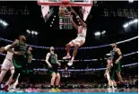  ?? ?? CHICAGO: Dalen Terry #25 of the Chicago Bulls dunks in the second half against the Boston Celtics at the United Center on March 23, 2024 in Chicago, Illinois. — AFP