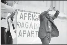  ?? (File Photo/AP/Eric Risberg) ?? Tutu greets a crowd of 10,000 people May 14, 1985, during a rally at the Greek Theater on the University of California at Berkeley, Calif., campus. Tutu praised the students for their opposition to apartheid in South Africa.