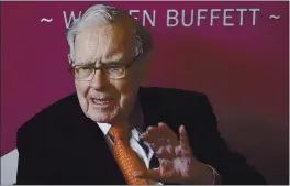  ?? NATI HARNIK — THE ASSOCIATED PRESS FILE ?? Warren Buffett, Chairman and CEO of Berkshire Hathaway, speaks during a game of bridge following the annual Berkshire Hathaway shareholde­rs meeting in Omaha, Neb.