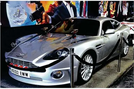  ??  ?? The Aston Martin driven by James Bond in “Die Another Day” is one of the attraction­s at the Austin Auto Show.