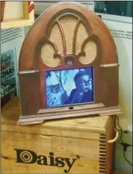  ?? (Special to the Democrat-Gazette/Marcia Schnedler) ?? An old-time radio is rigged to show snippets from “A Christmas Story.”