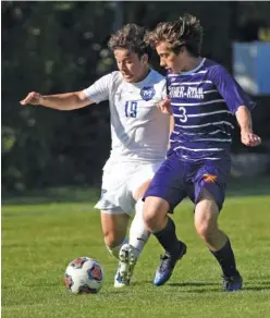  ?? STAFF PHOTO BY ANGELA LEWIS FOSTER ?? McCallie’s Drew Viscomi, left, and Father Ryan’s Keefe Eller battle for control of the ball during Wednessday’s Division II-AA match at McCallie.