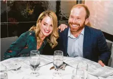  ?? Gary Fountain / Contributo­r ?? Sarahbeth and Pierce Bush landed a coveted table at Steak 48 when the restaurant reopened last Friday.