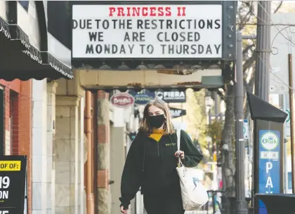  ?? DAVID BLOOM ?? The marquee outside the Princess Theatre on 82 Avenue sets out reduced hours of operation due to COVID-19 restrictio­ns.