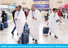  ?? — Photos by Fouad Al-Shaikh ?? KUWAIT: Pilgrims are seen leaving through Kuwait Internatio­nal Airport to Makkah, Saudi Arabia to perform Hajj.