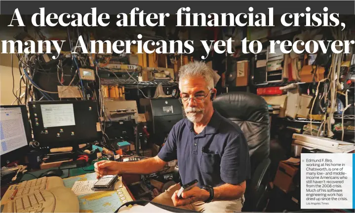  ?? Los Angeles Times ?? Edmund F. Biro, working at his home in Chatsworth, is one of many low- and middleinco­me Americans who still haven’t recovered from the 2008 crisis. Much of his software engineerin­g work has dried up since the crisis.