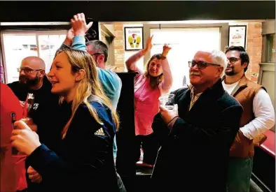  ?? Dan Haar/Hearst Connecticu­t Media ?? Fans enjoy Tuesday’s action at the Trinity Bar & Restaurant in New Haven.