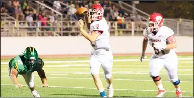  ?? Courtesy Photo/Coahoma ISD ?? Coahoma quarterbac­k Kolt Redden looks to make a connection with his receiver as he rolls out to his left during a play last Friday night.