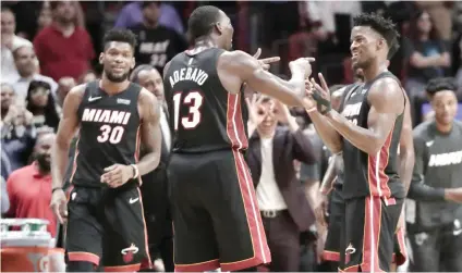  ?? AP FOTO ?? LATE CHARGE.
The Miami Heat had to fight back from six down in the final minute to win by 14 in overtime.