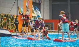  ??  ?? A 65m long flatwater pool is the venue for stand up paddleboar­ding sessions