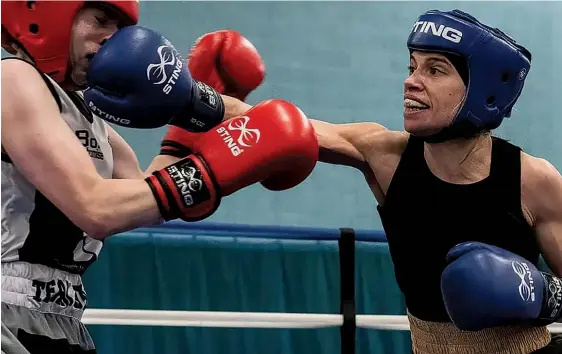  ?? Photo: CLIVE WOOD/ENGLAND BOXING ?? THROUGH THE GUARD: Harris has worked on being ‘more assertive’ in the ring