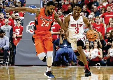  ?? JAY LAPRETE / ASSOCIATED PRESS ?? Ohio State’s C.J. Jackson brings the ball upcourt against Illinois’ Mark Alstork during the second half of a hard-fought matchup won by the Buckeyes, who had to rally from a double-digit first-half deficit.