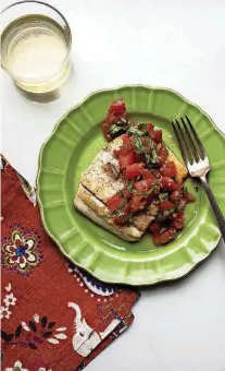 ?? [LAURA AGRA VIA AP] ?? Pan-seared fish with tomato basil relish.