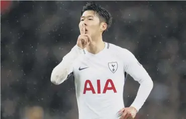  ??  ?? 0 Son Heung-min silences the visiting West Ham United supporters with his equaliser at Wembley.