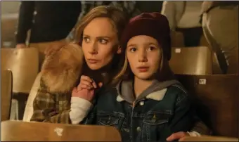  ?? ?? Fiercely protective mother Dorothy Lyon (Juno Temple) looks out for her pre-teen daughter Scotty (Sienna King) in season five of Noah Hawley’s anthology crime series “Fargo.”