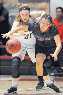  ?? JIM THOMPSON/JOURNAL ?? Shiprock’s Tierra Clichee, right, and Hope Christian’s Alivia Lewis battle for a loose ball during the 4A state championsh­ip game Friday.