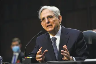  ?? Drew Angerer / Associated Press ?? Merrick Garland, President Biden’s nominee to be attorney general, testifies at his confirmati­on hearing before the Senate Judiciary Committee on Capitol Hill in Washington.