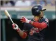  ?? TONY DEJAK — THE ASSOCIATED PRESS ?? Francisco Lindor hits a single off Tigers starting pitcher Justin Verlander in the fifth inning on July 10 at Progressiv­e Field.