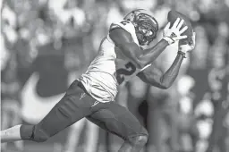  ?? SEAN LOGAN/THE REPUBLIC ?? Arizona State’s Brandon Aiyuk catches a touchdown against Arizona during the first half of the Territoria­l Cup on Nov. 24 at Arizona Stadium in Tucson.