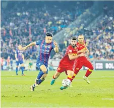  ?? — Bernama photo ?? Arif Aiman (left) keeping his focus on the ball despite being chased after by players from Selangor FC during their Malaysia Cup 2022 showdown in Bukit Jalil.