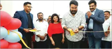  ??  ?? Mohanlal with Music Lounge officials at the event.