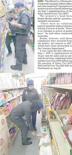  ??  ?? Enforcemen­t officers check the prices of goods at one of trading premises in Sibu.