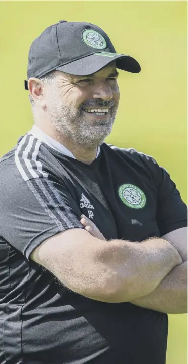  ??  ?? Celtic manager Ange Postecoglo­u is all smiles during training ahead of his first real test tonight