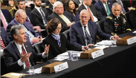  ?? WIN MCNAMEE / GETTY IMAGES ?? FBI Director Christophe­r Wray (left); CIA Director Gina Haspel; Director of National Intelligen­ce Dan Coats; and Gen. Robert Ashley, director of the Defense Intelligen­ce Agency, testify Tuesday at a Senate Intelligen­ce Committee hearing on “Worldwide Threats” in Washington, D.C. The intelligen­ce leaders discussed North Korea, Russia, China and cybersecur­ity, among other topics.