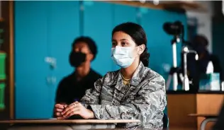  ?? Marie D. De Jesús / Staff photograph­er ?? Westbury High School student and Air Force Junior ROTC cadet Jennifer Orellana, 15, watches the transmissi­on from space Thursday as Walker becomes commander of the Space Station.