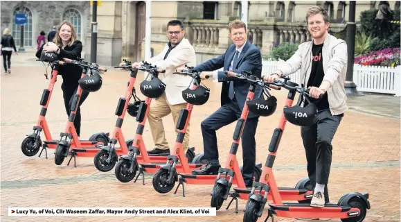  ??  ?? Lucy Yu, of Voi, Cllr Waseem Zaffar, Mayor Andy Street and Alex Klint, of Voi