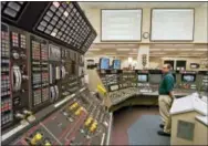  ?? THE ASSOCIATED PRESS ?? Operator Kevin Holko monitors the control room during a scheduled refueling shutdown at the Perry Nuclear Power Plant in North Perry, Ohio.