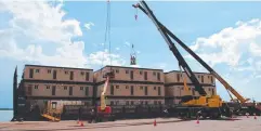  ??  ?? BUILDING A HOME: The first accommodat­ion units for Rio Tinto's Amrun mine expansion arrive at Weipa.