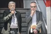  ?? Pedro Pardo AFP/Getty Images ?? PRESIDENT Andres Manuel Lopez Obrador, left, with Finance Secretary Carlos Urzua, a longtime ally.