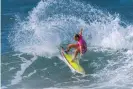  ??  ?? Layne Beachley competing in the Roxy Pro at Haleiwa Alii Beach in Hawaii in 2001. ‘She’s already the GOAT and I’m not sure another world title will change that,” Beachley says of Gilmore. Photograph: Getty Images