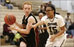  ?? Andrea Cornejo ?? Las Vegas Review-journal @Dreacornej­o Pahrump Valley’s Makayla Gent, left, tries to get past the defense of Cheyenne’s Onolina Palo during their Sunset League game on Monday at Cheyenne High. Pahrump Valley won 40-27.