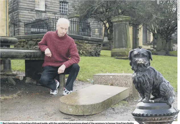  ??  ?? 0 Bert Hutchings, a Greyfriars Kirkyard guide, with the vandalised gravestone ahead of the ceremony to honour Greyfriars Bobby