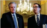  ??  ?? Treasury Secretary Steven Mnuchin (right), with White House chief of staff Mark Meadows, speaks to the media after meeting with Senate Majority Leader Mitch McConnell.